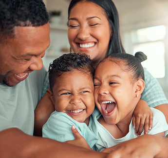 Happy family with parents and children